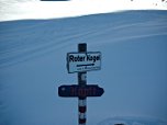 Wegweiser an der Hütte zum Roten Kogel